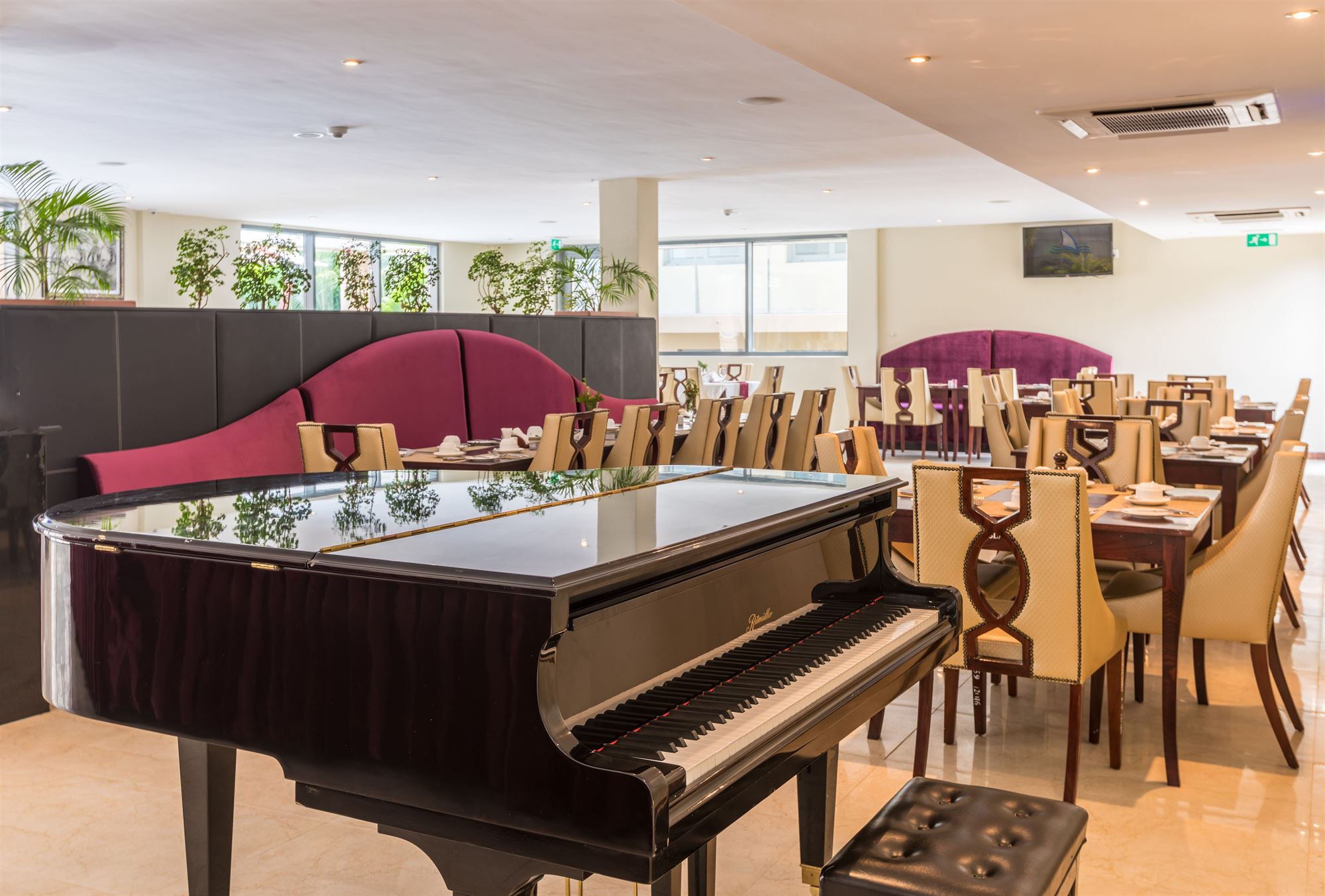 The restaurant at Ngalawa Hotel & Resort, with its grand piano