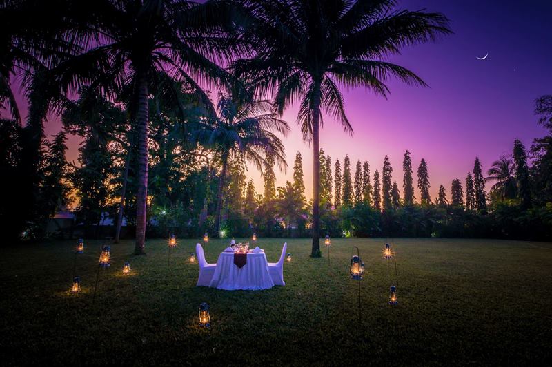 Candlelit dinner on the hotel garden lawn
