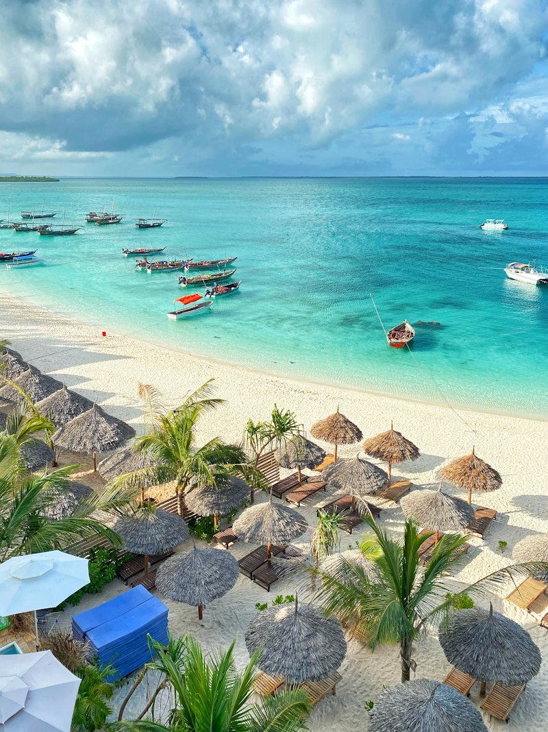 Zanzibar beach with traditional dhow boats